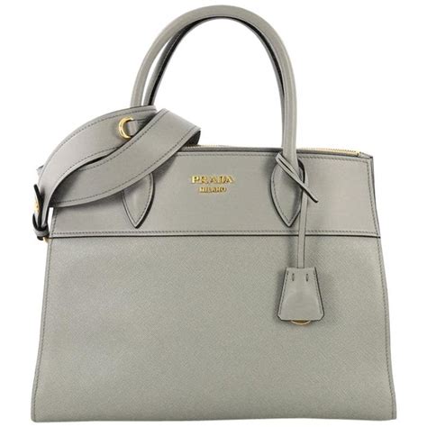 prada small paradigme bag in mercury grey|PRADA Saffiano City Calfskin Small Paradigme Bag.